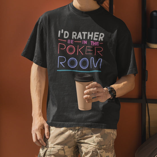 how your love for the game with the "I'd Rather Be in the Poker Room" t-shirt! This comfortable tee is perfect for poker enthusiasts who dream of chasing that royal flush or bluffing their way to victory. Made from high-quality, breathable fabric, this t-shirt is ideal for long nights at the table or casual wear that lets everyone know where your heart lies.  Available in various sizes, this poker tee makes a fantastic gift for any player.  Rep your passion for the game - order yours today!